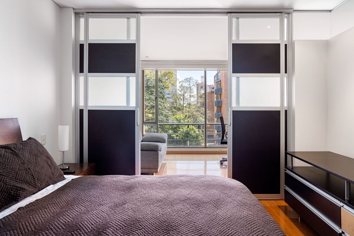 Bright room with tall sliding glass panels