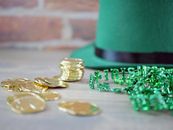Gold Coins on Green Textile