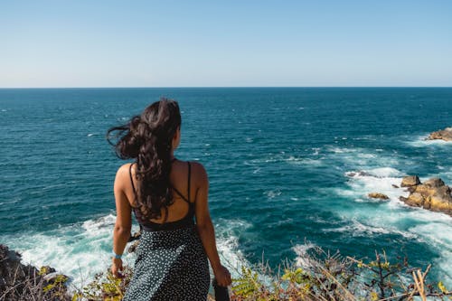 Back View of a Woman Near the Sea