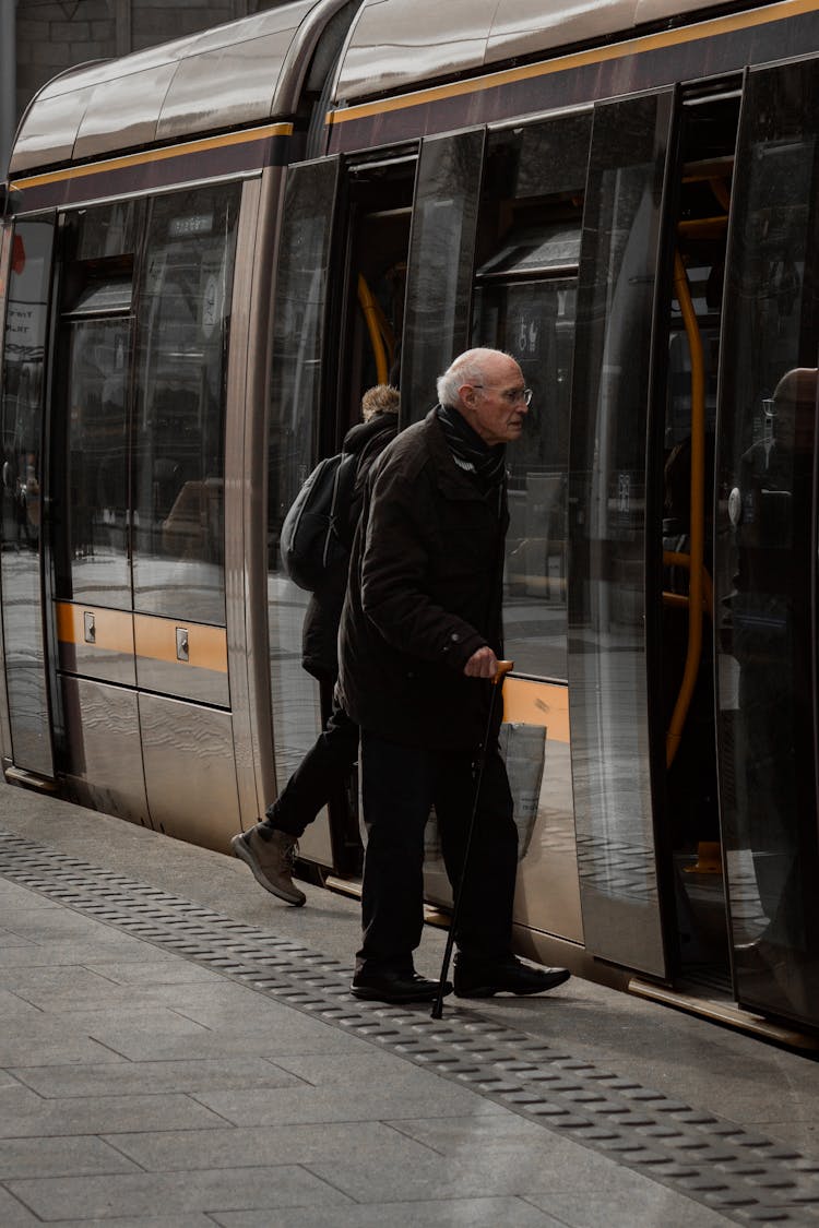 Man Getting On The Train