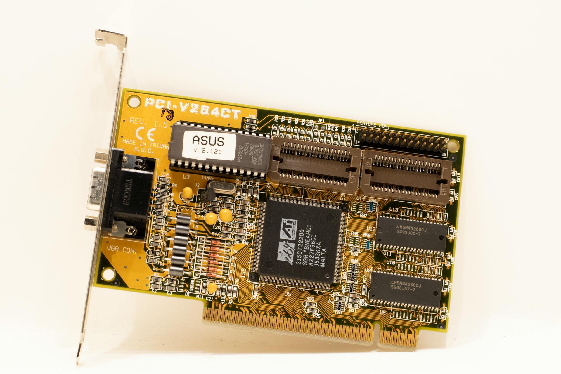 Detailed close-up of a vintage PCI graphics card showcasing complex electronic circuits and components.