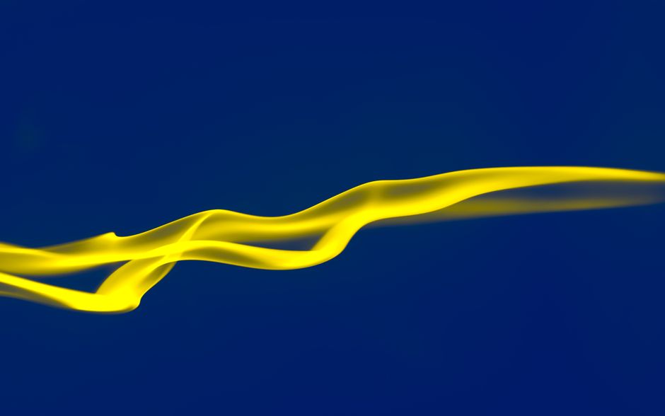 Vivid abstract image with a flowing yellow ribbon on a deep blue backdrop.