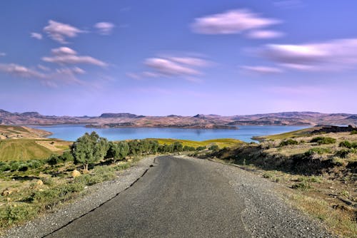 Asphalt Road Towards the Lake