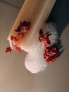 Close-Up Shot of Soap with Dried Red Flowers