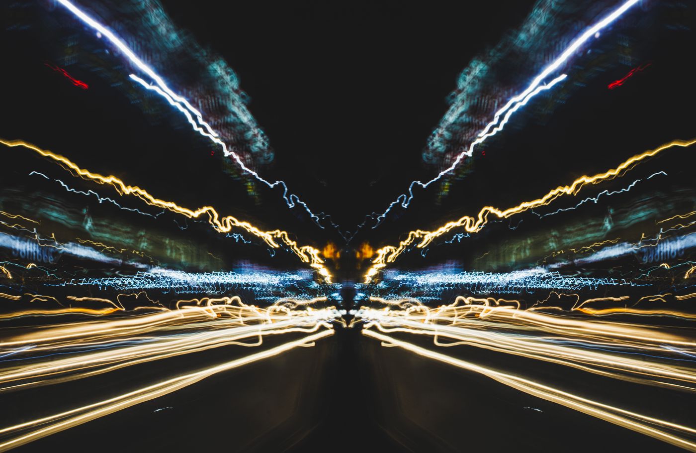 Long-exposure light trails through a night cityscape — photo by Nothing Ahead on Pexels