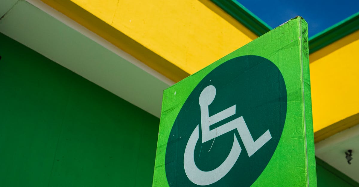 Green Parking Signage for PWD · Free Stock Photo