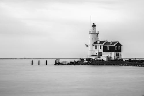 Grayscale Photo of the Paard van Marken Lighthouse 