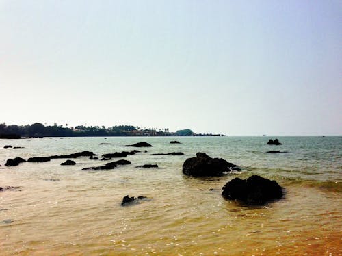 A Rocky Shore under a Clear Sky