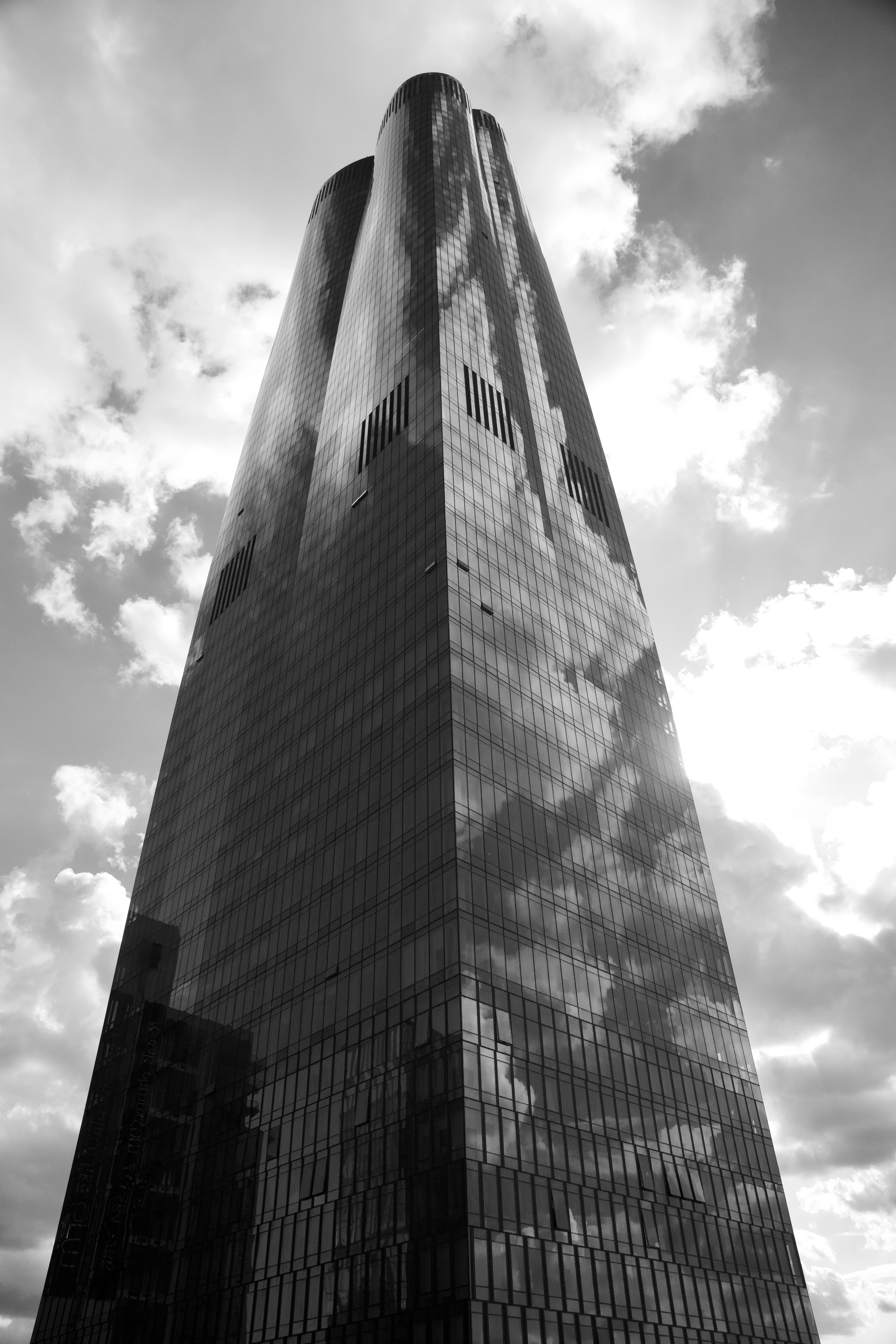 A Grayscale of a Tall Building · Free Stock Photo