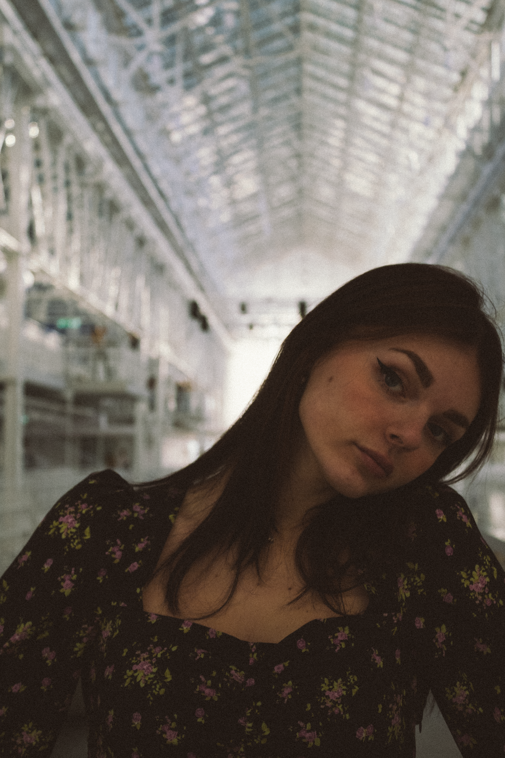 A Pretty Woman Wearing a Floral Top · Free Stock Photo