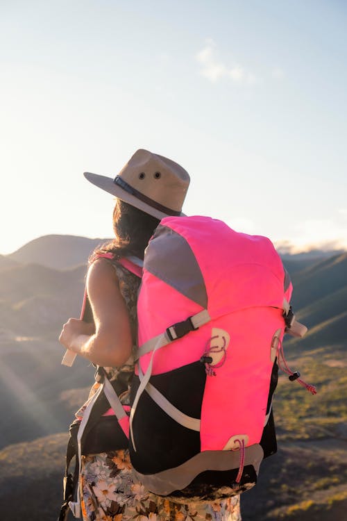 Back View of a Woman with a Pink Backpack