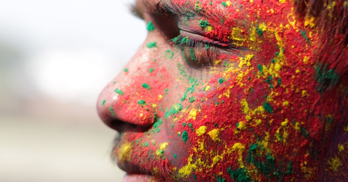 Bearded Man with Colored Powder on His Face · Free Stock Photo