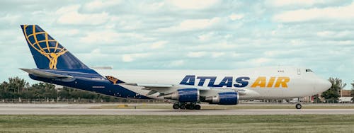 Photo of a Blue and White Airplane