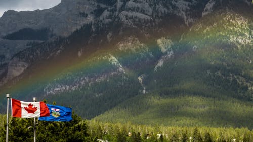 Canada & Alberta Flags with a Rainbow