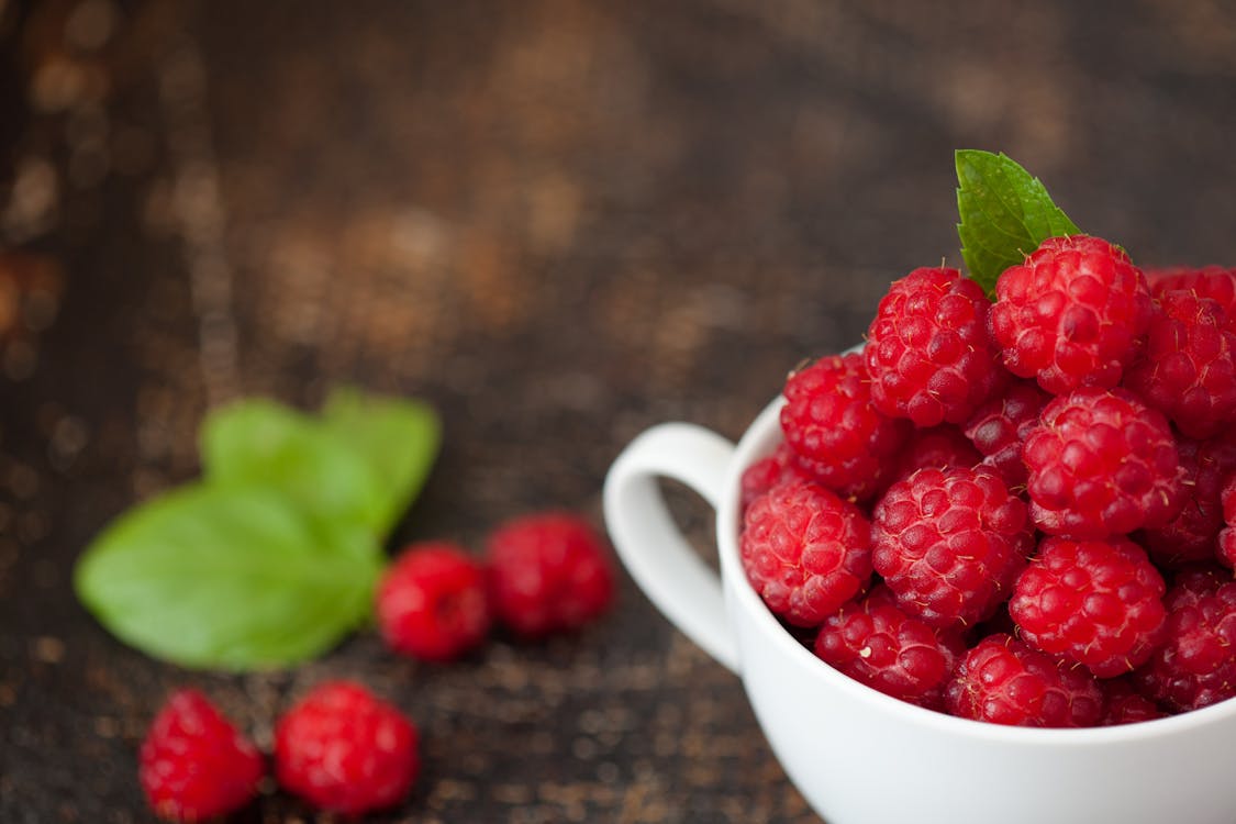 Free Red Raspberries in Mug Stock Photo
