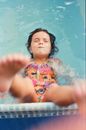 Child Falling into Swimming Pool on Back 