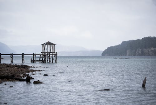 Pier and a Hut on the Shore 