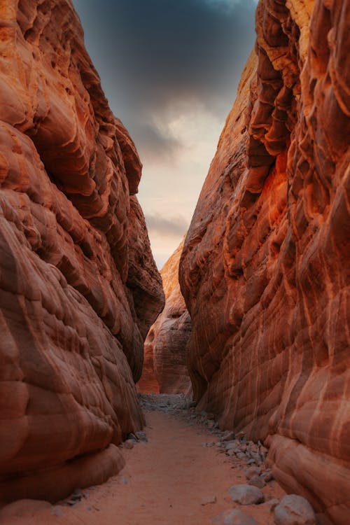 Walkway between Large Sandstone Walls of a Canyon 