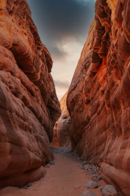 Explore a stunning sandstone canyon pathway in Las Vegas, showcasing rugged textures and natural beauty.