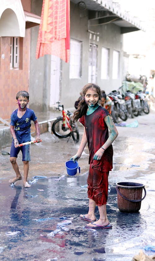 Boy and Girl Playing Outdoors 