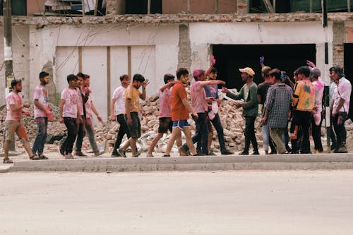 Group of Men Covered in Colorful Powder from the Holi Festival 