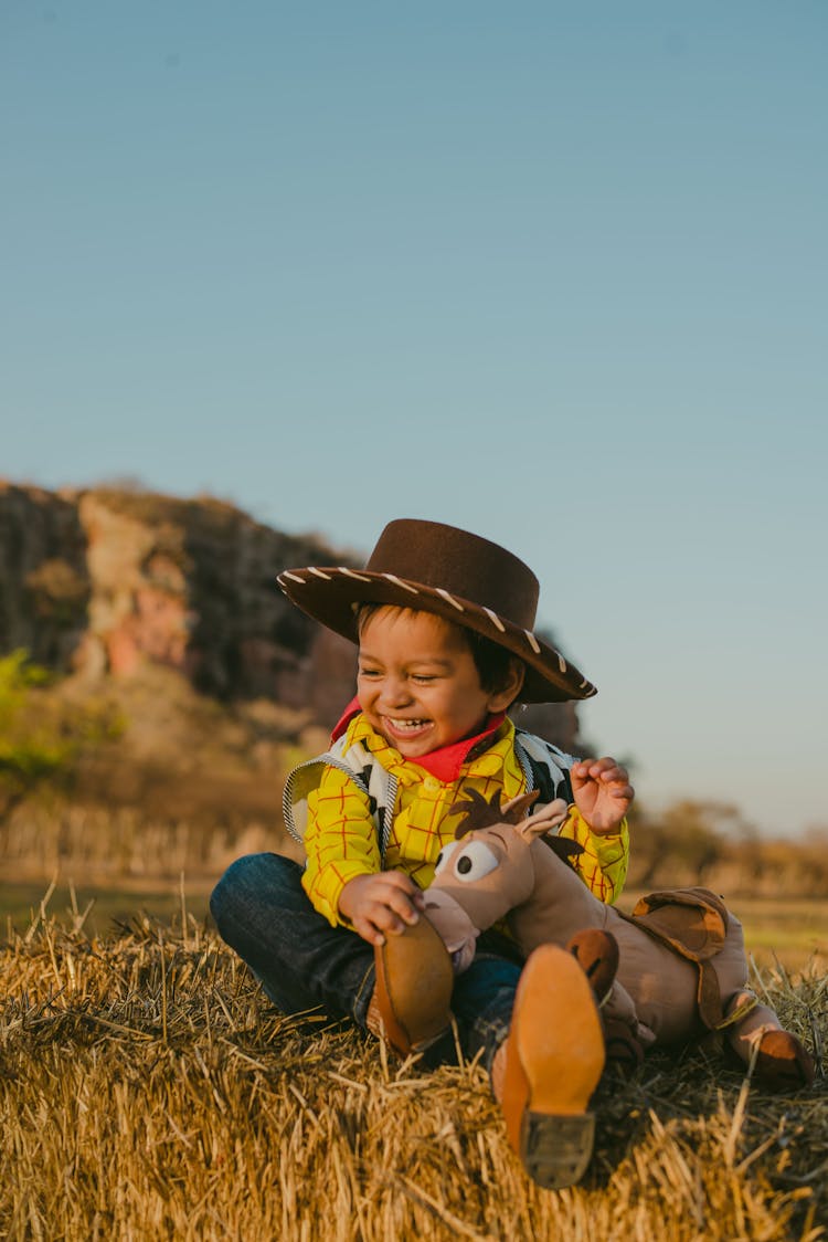 Smiling Cute Little Boy In Cowboy Costume