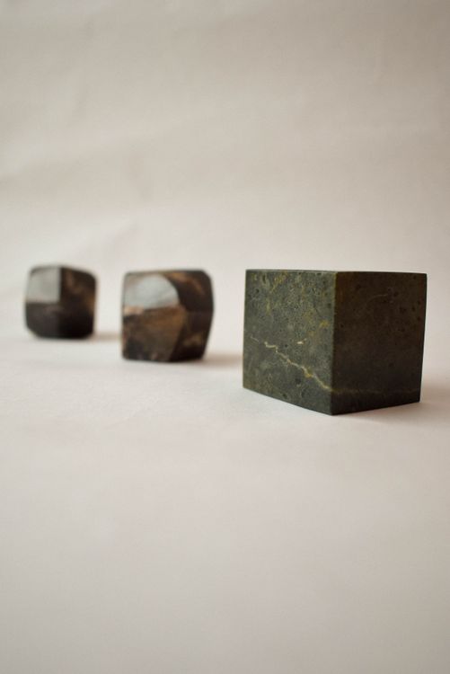 Normal Cube Rocks A Cube and Rocks on a White Background · Free Stock Photo