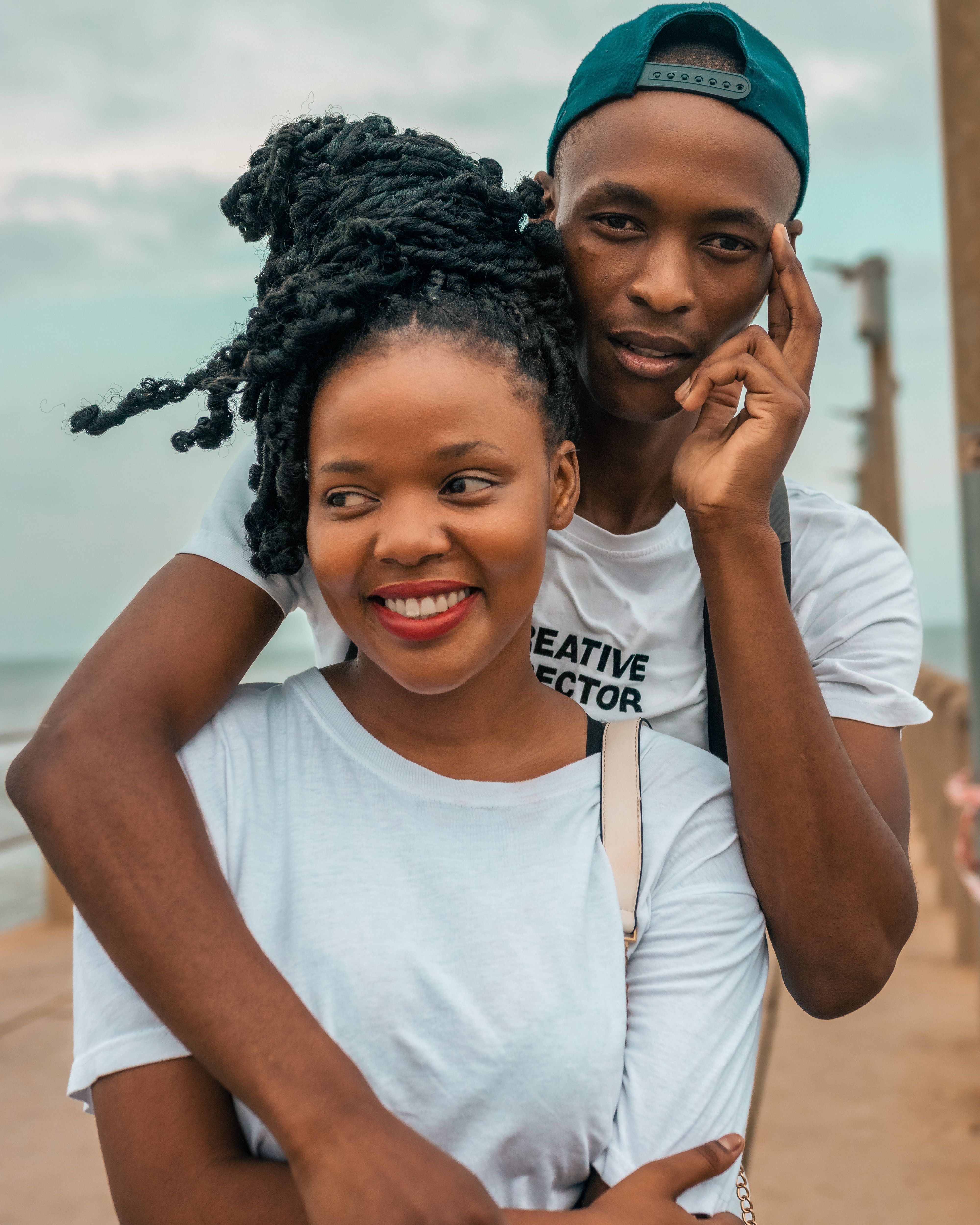 Man Hugging a Woman From Behind · Free Stock Photo