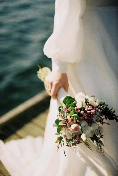 A Bride Holding a Bridal Bouquet