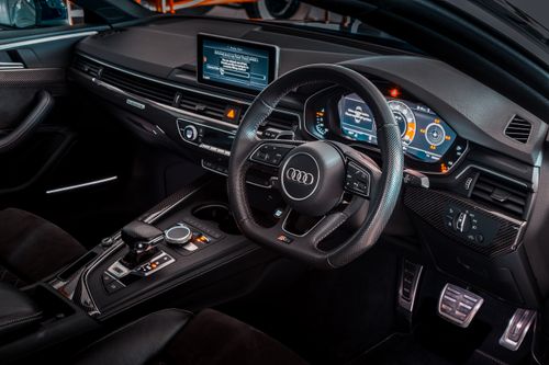 Free Explore the sleek design and advanced technology of this luxurious Audi car interior. Stock Photo