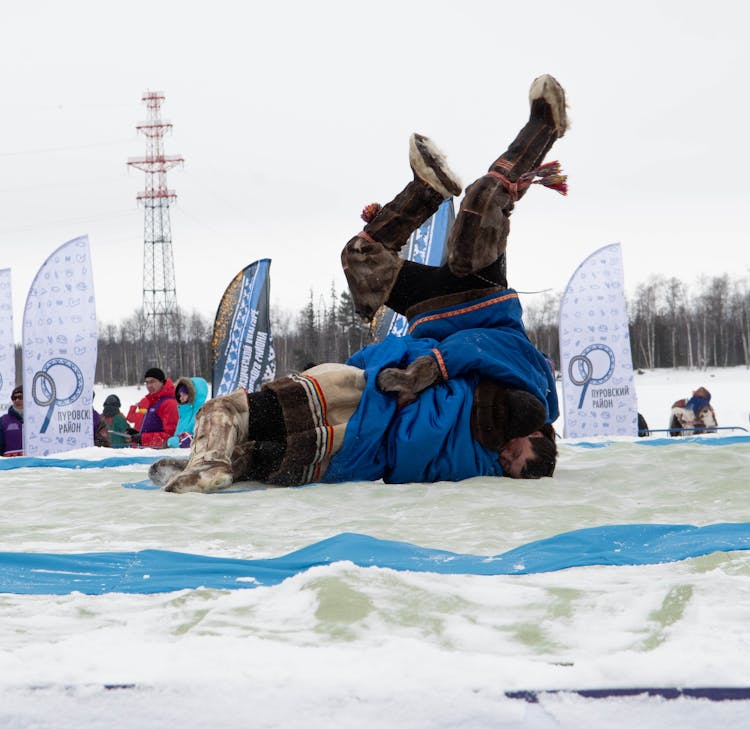 Men Wrestling In A Sporting Competition