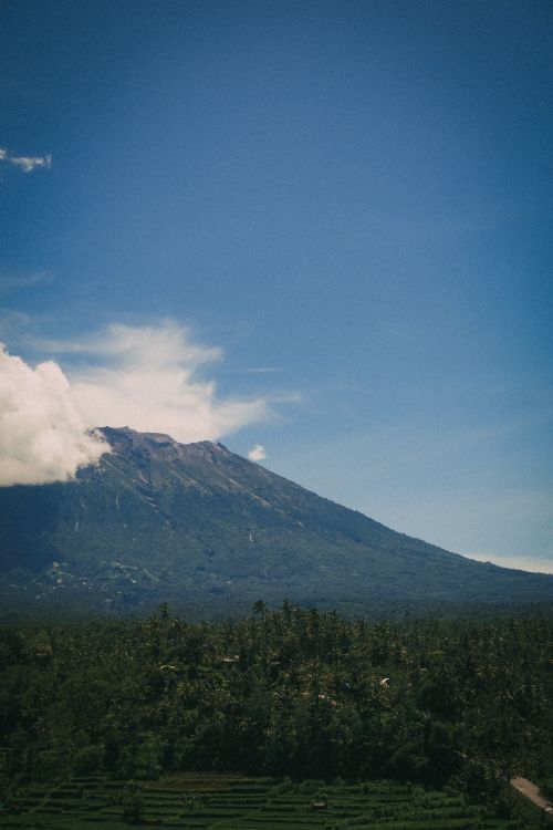 Free Breathtaking view of Mount Banahaw, a famous volcano in the Philippines, against a stunning blue sky. Stock Photo