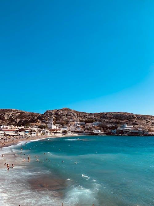 Clear Sky over Sea Shore with Beach in Town