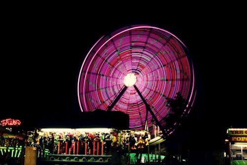 Free Time-lapse Photo of Ferris Wheel during Nighttime Stock Photo
