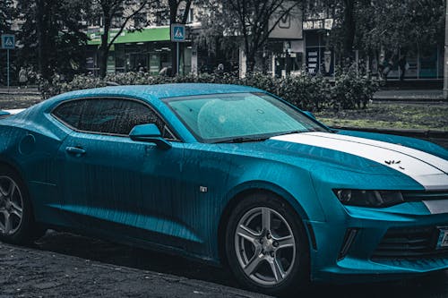 Close-Up Shot of Blue Luxury Car