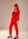 A Woman Wearing Red Clothes and Black Mask