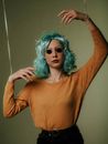 Woman in Yellow Long Sleeve Shirt