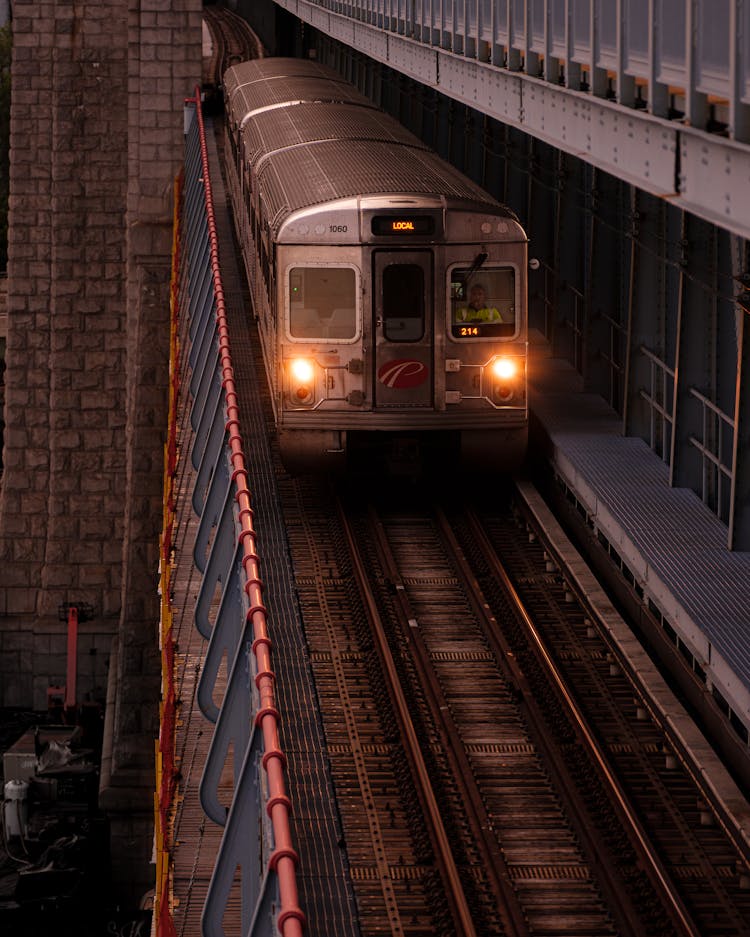 Subway Train Running On Viaduct In City