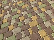 Green and Brown Brick Pavement