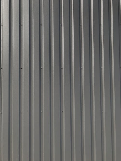 Closeup of a Gray Corrugated Fence