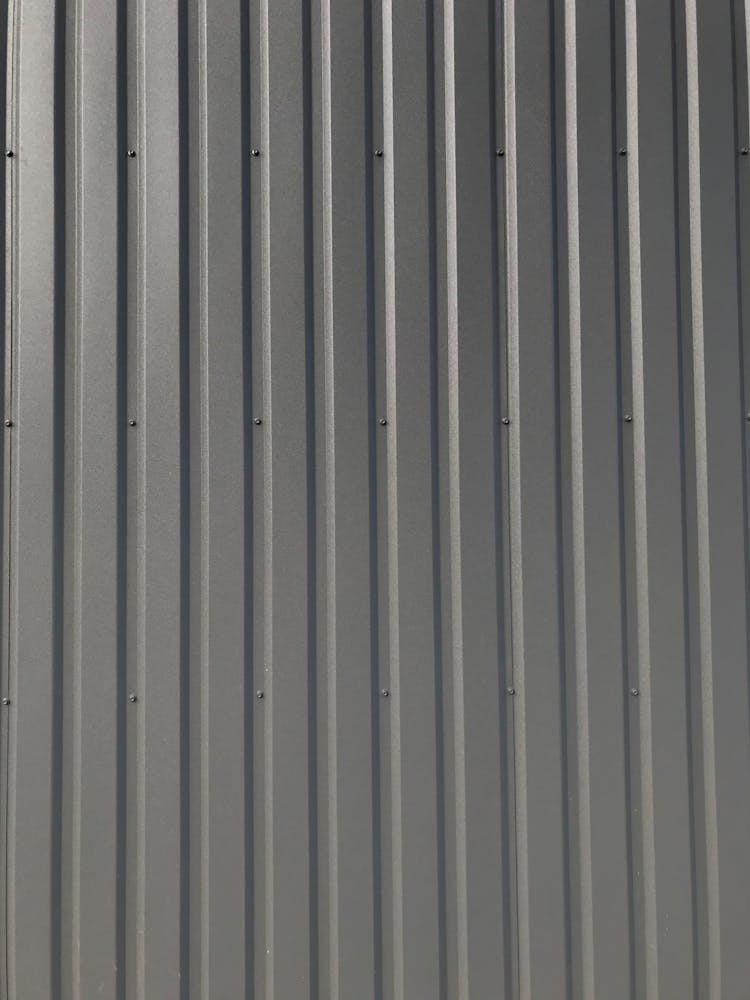 Closeup Of A Gray Corrugated Fence