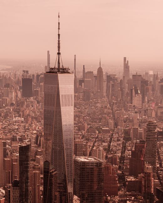 A stunning aerial view of New York City featuring the iconic One World Trade Center.
