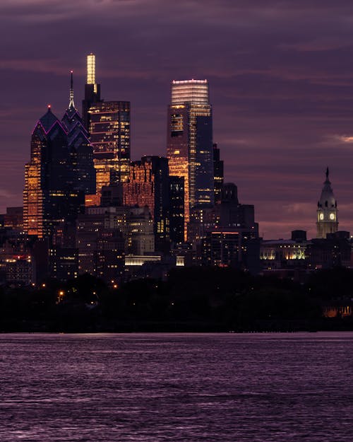 Free View of Philadelphia City by Night from Delaware River Stock Photo