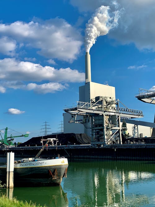 Steel Structure with Exhaust Pipe Near Body of Water