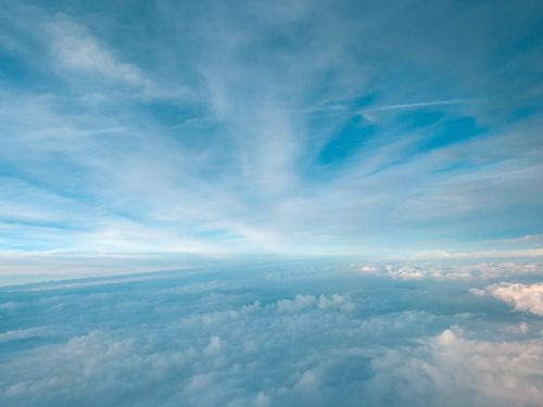 Free A stunning view of a blue and fluffy cloudscape, capturing the serene atmosphere over London. Stock Photo