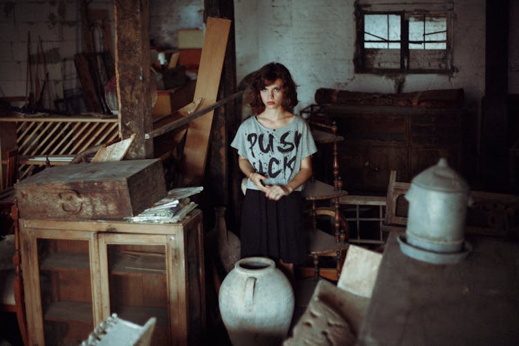 A Young Woman Inside A Stock Room