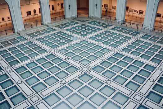 Explore the stunning geometric floor design in the beaux-arts court at Brooklyn Museum, New York City.
