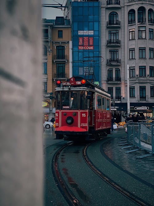 Red and Black Train on Rail Road