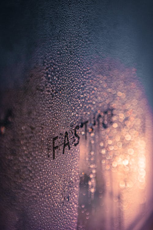 Closeup of a Steamy Window with a Script