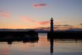 Pier lighthouse at dusk by Emre Acar on Pexels